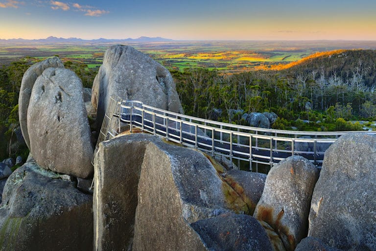 Panorama of Castle Rock in the Porongurup Ranges looking towards the Stirling Ranges at Sunset and the new Walkway